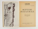 an open book with a black and white photo of an old building
