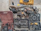 a lot of tools that are laying out on the ground