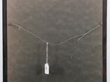 an image of a painting with a white tag hanging from it ' s side