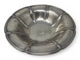 an antique silver plate on a white background with a white background