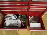 a red tool box with a lot of tools inside of it