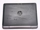 a close up of a laptop on a white surface
