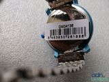 a close up of a wrist watch with a barcode on it