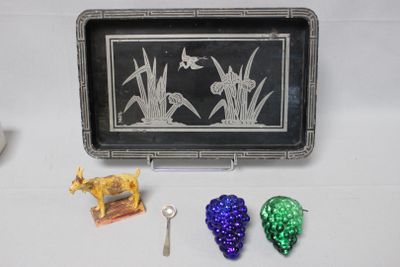 a silver tray with a picture of birds and grapes on it