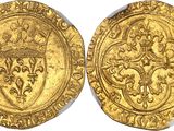 a gold coin with a crown on the front and a shield on the back