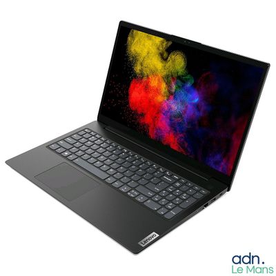 the laptop is open on a white surface with colorful paint on the screen