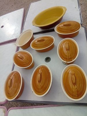 many bowls of peanut butter sitting on a table