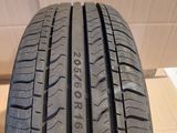 a close up of a tire on a wooden floor