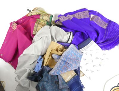 a pile of clothing that is sitting on a table