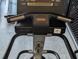 a close up of a tread on a machine in a gym