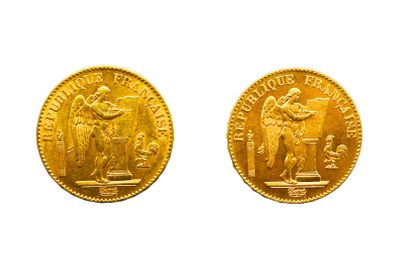 two pieces of gold coins, one of which has a statue and the other of which is a woman