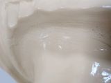 a close up view of a toilet bowl with the lid down