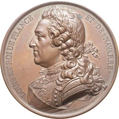 une image montrant un gros plan d'une médaille sur fond blanc