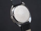 a close up of a wrist watch with a black strap