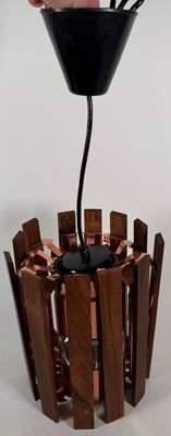 a person that is putting something in a vase