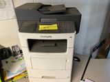 a printer that is sitting on top of a desk