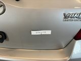 a close up of a car with a sticker on the back of it