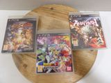 three video games on a wooden tray on a table