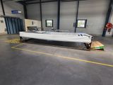 a boat that is sitting in a building with a ramp