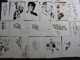 a lot of drawings that are on the table