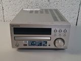 an image of a cd player sitting on top of a table