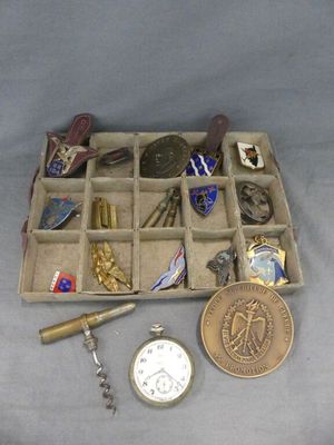 a box of assorted items that include a pocket watch, a pocket watch, a pocket watch, a pocket watch, and a pocket watch