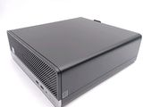 an image of a black computer on a white surface