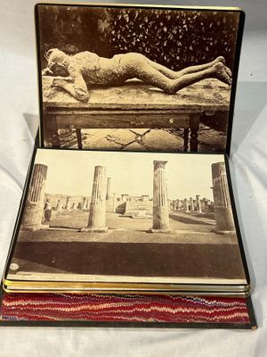 a picture of a woman laying on a bed in a case