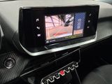 a car dashboard with a monitor in the center of it