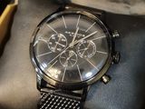 a watch that is sitting on top of a box