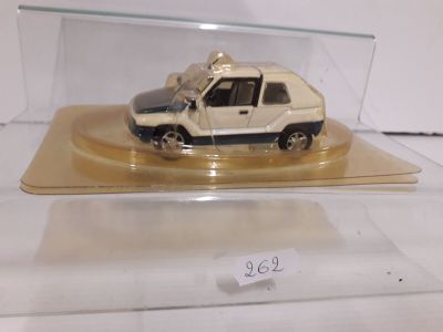 a small toy truck in a clear display case