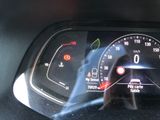 a close up of a car ' s dashboard with a speedometer
