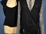 two mannequins and a jacket on a mannequin stand