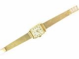 an image of a gold watch with a white face on a white background