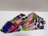 two pieces of fabric on a white surface