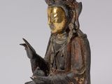 an image of a statue of a person with a bird in his hand