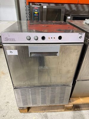 silver dishwasher sitting on pallets in a warehouse area