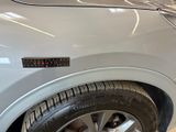 a close up of a car with a sticker on the side of it