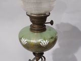 an image of a lamp with a glass shade on top of it