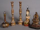 five different types of candlesticks on a table
