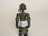 an image of a statue of a man with a sign in his hand
