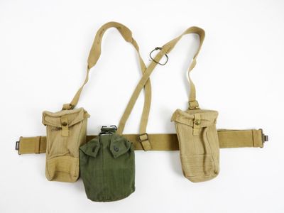 a close up of a belt with two bags attached to it