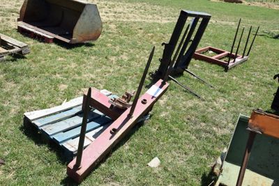 many different types of machinery in the grass