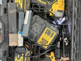 many tools in a tool box on the floor