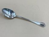 a spoon that is sitting on a table