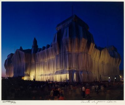 an image of a large building with a lot of people standing around it