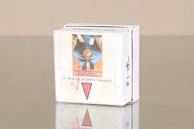 a white box with a picture of a man on it