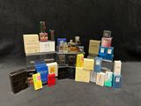 many different types of perfumes on display on the table