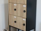 an image of a black and wood cabinet in a living room
