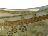 a glass bowl that has a design on it